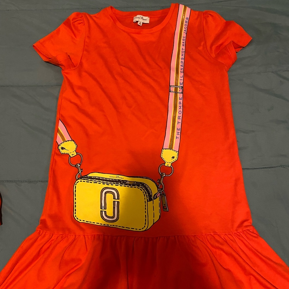 Girls size12 Orange Marc Jacob like new only took professional pictures in dress